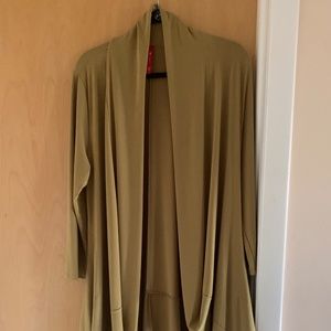 Sophisticated olive green tunic length jacket.